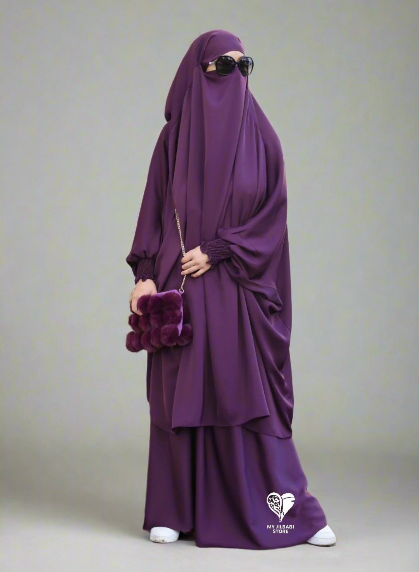 2 piece jilbab in nida fabric. featuring 3 pockets, ruffle wudu friendly sleeves and an integrated niqab. COLOUR: PURPLE