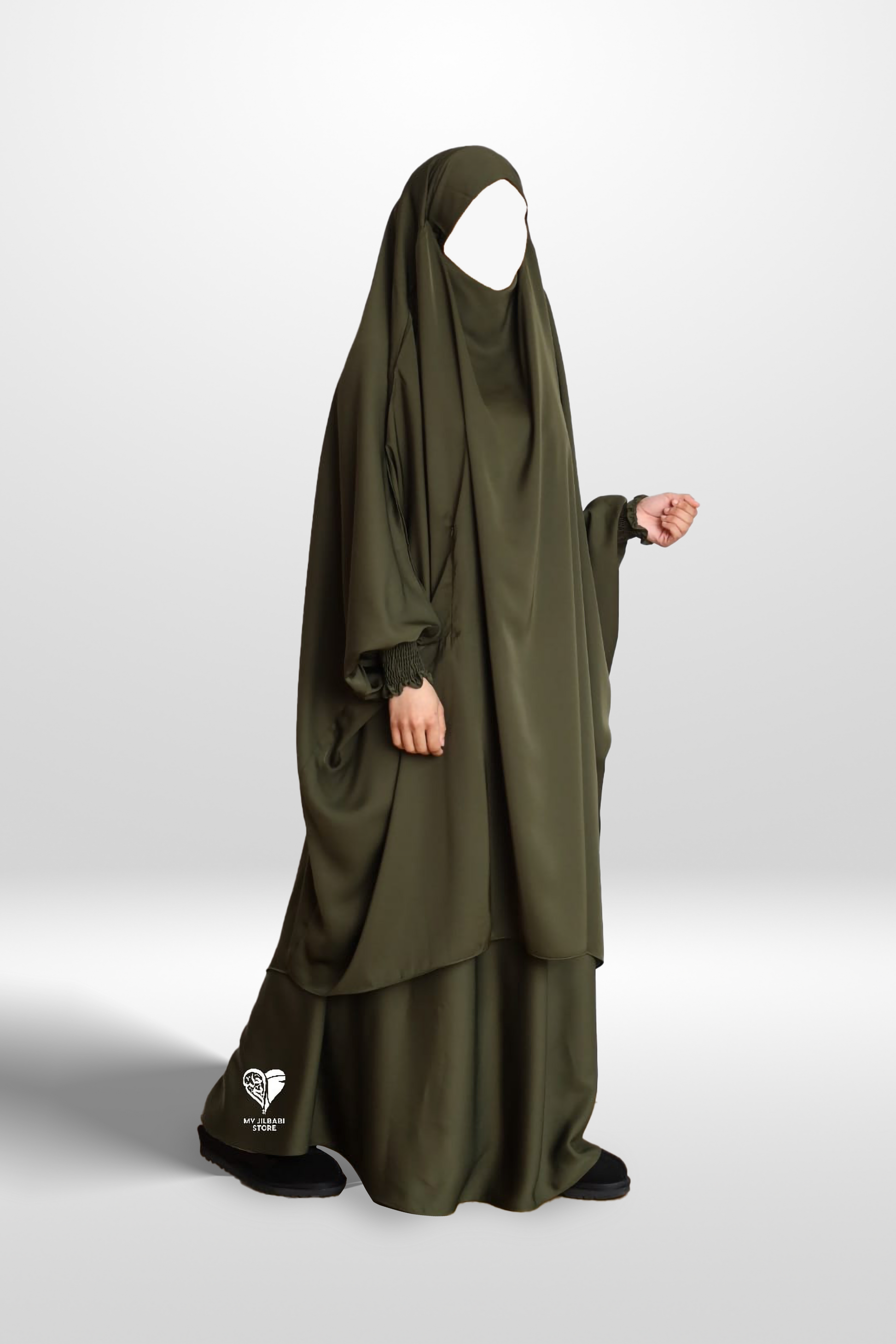 2 piece jilbab in nida fabric. featuring 3 pockets, ruffle wudu friendly sleeves and an integrated niqab. colour: khaki