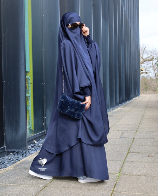 2 piece jilbab in nida fabric. featuring 3 pockets, ruffle wudu friendly sleeves and an integrated niqab. COLOUR: NAVY