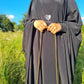 Black jilbab close up sheen fabric